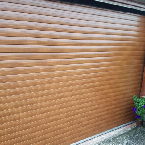 Domestic roller door