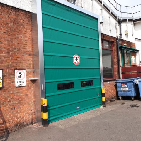 Rapid rise roller shutter door